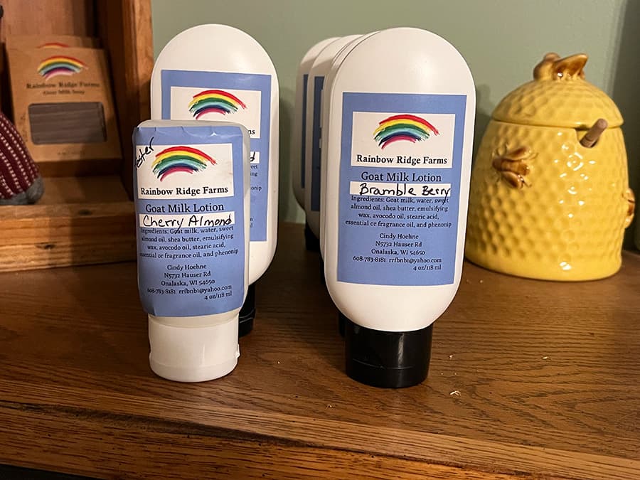 Bottles of Goat Milk Lotion from Rainbow Ridge Farms in Cherry Almond and Bramble Berry scents.